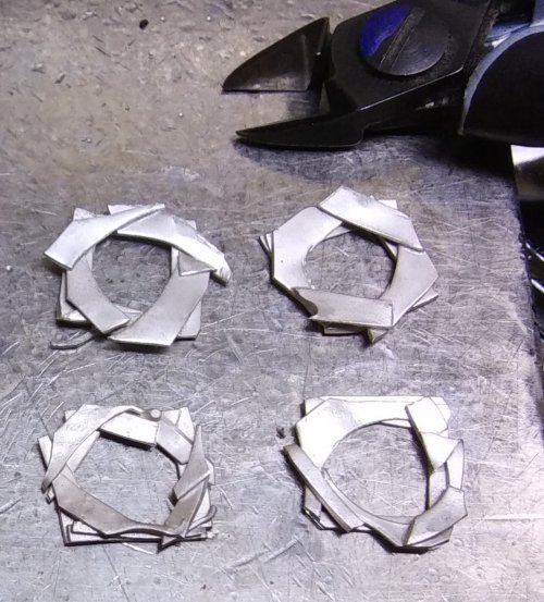 Judy Larson's Argentium Silver Scrap Chain - , Contemporary Wire Jewelry, Making Chain, Chain Making , Butane Torch, Soldering, Solder,  cut off some of the metal points.